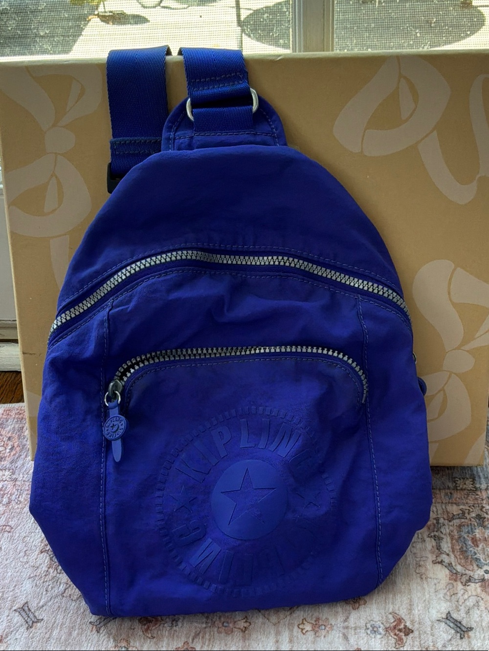 Kipling Royal Blue Sling Backpack with Embossed Logo